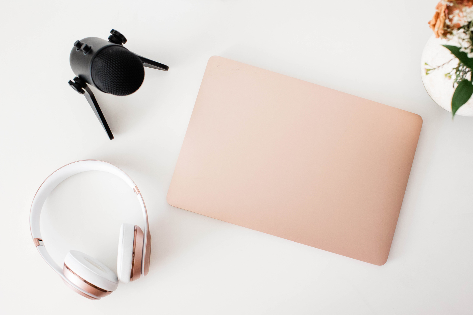 Wireless Microphone, Headphones and Laptop for Podcasting Flatlay